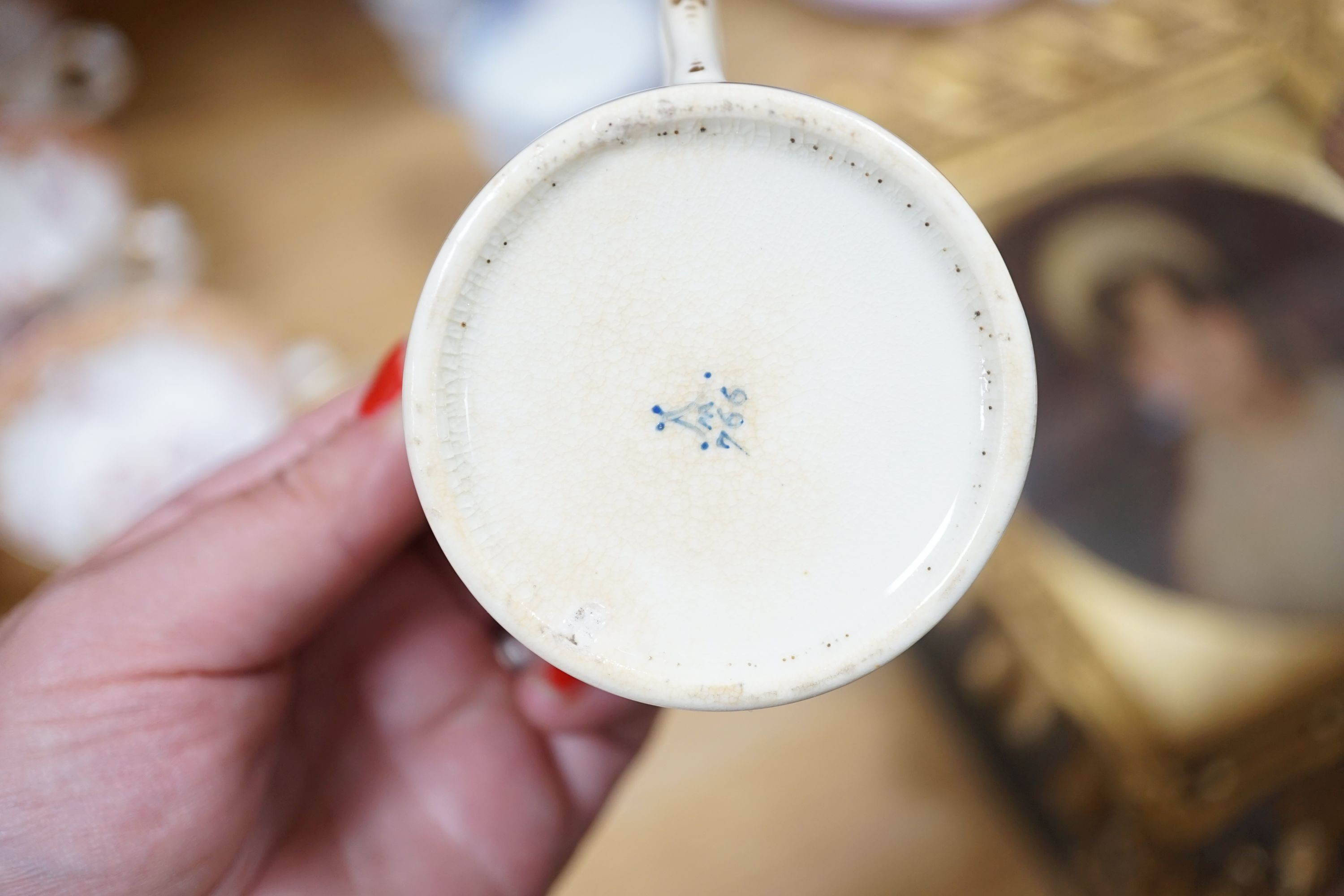A Victorian porcelain tea service and two coffee cans
